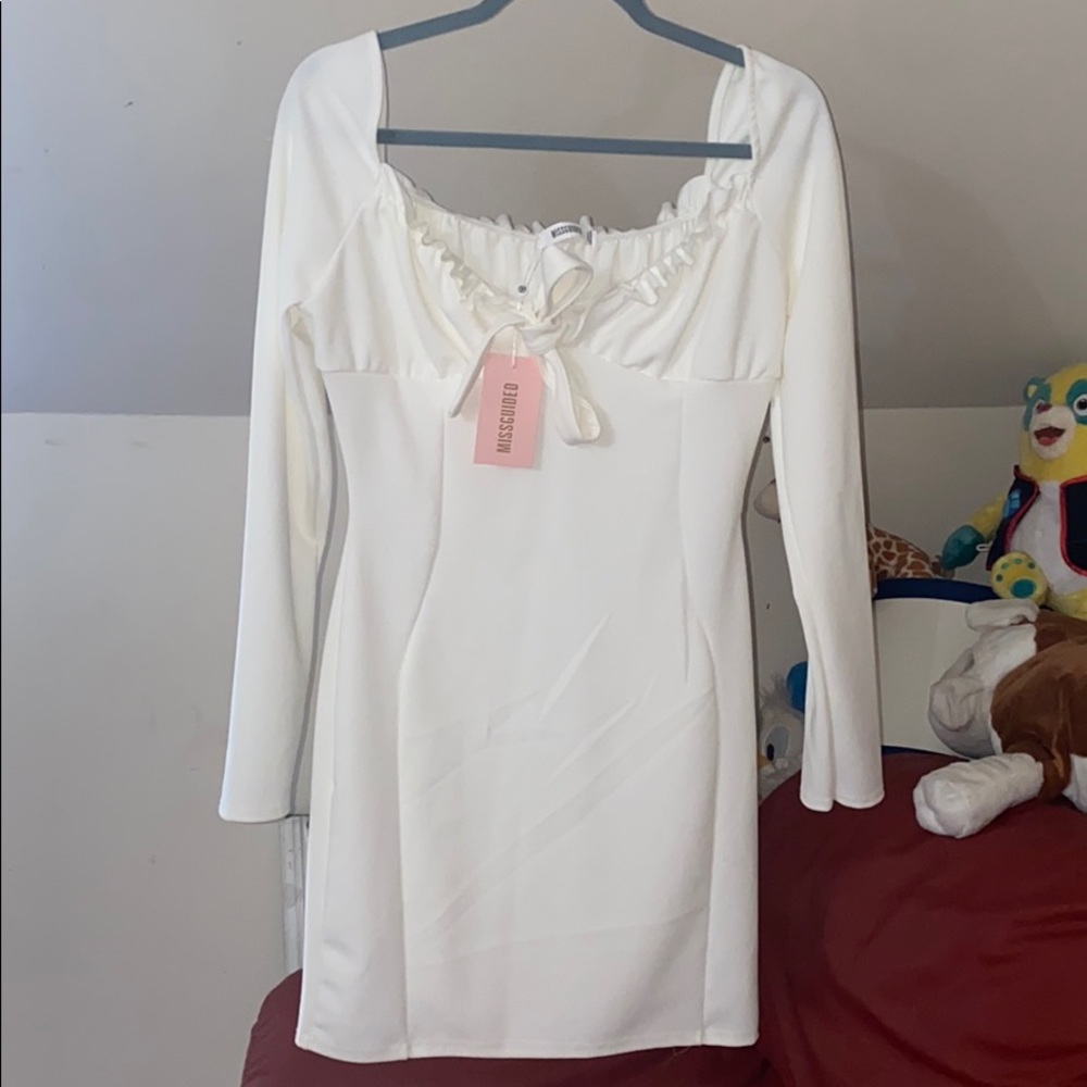 White dress very beautiful.